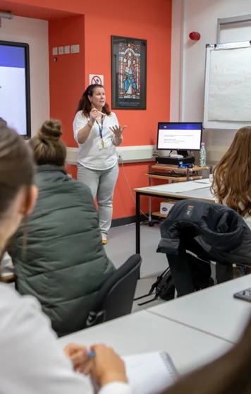Glasgow Kelvin College students actively participating in class, guided by their lecturer through interactive discussions and activities. Glasgow Kelvin College students actively participating in class, guided by their lecturer through interactive discussions and activities.